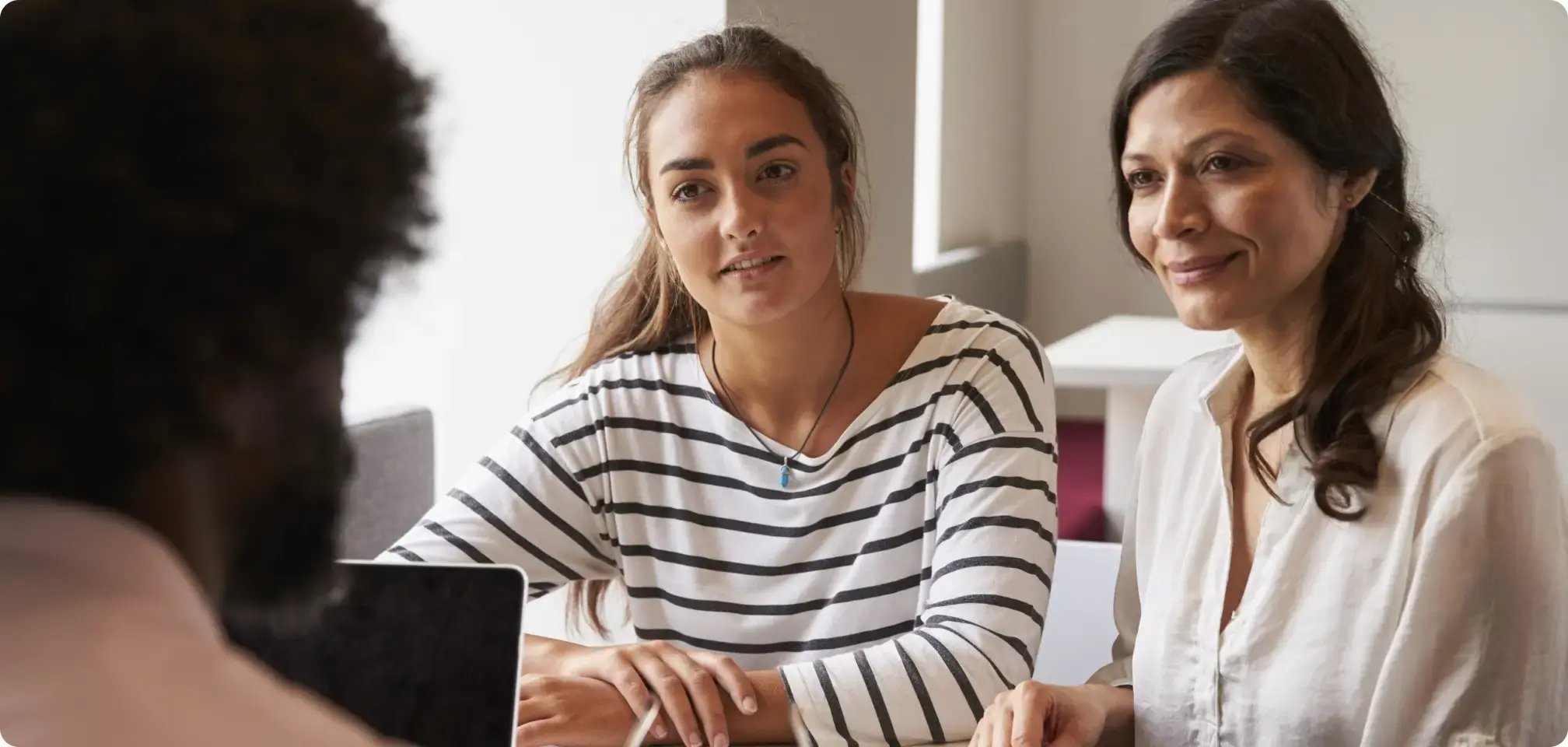 a parent talking to a school counselor