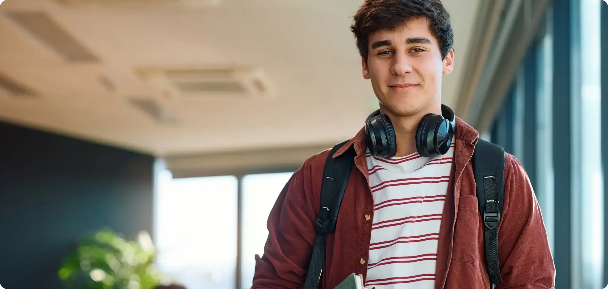 a student walking confidently outside