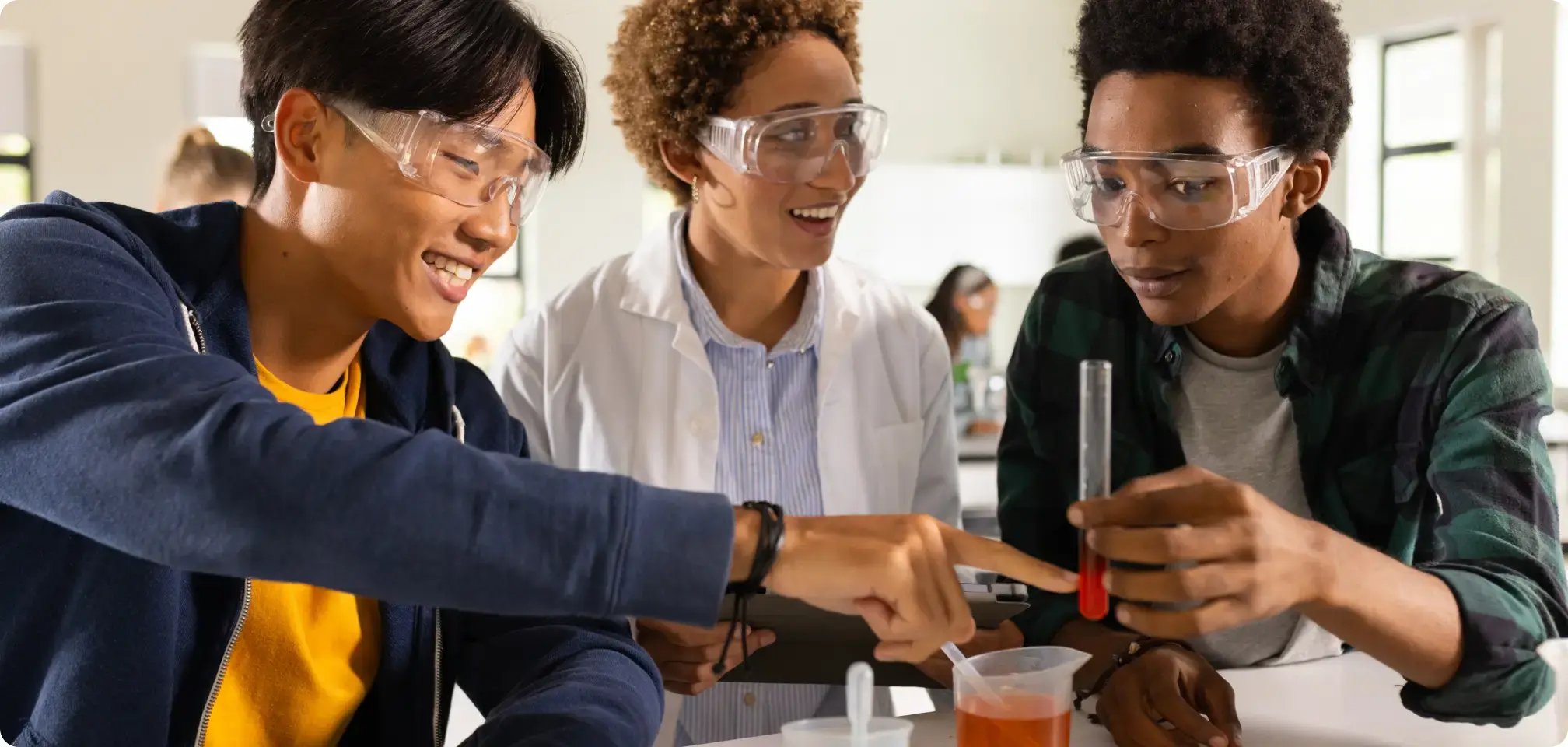 a student smiling with friends in class