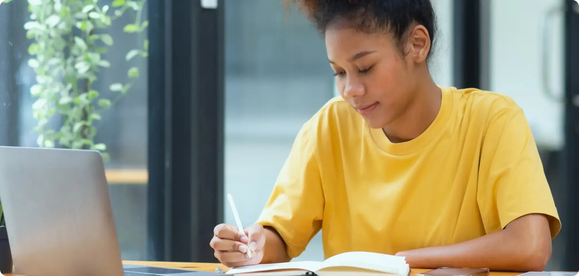 an adult student learning on a computer