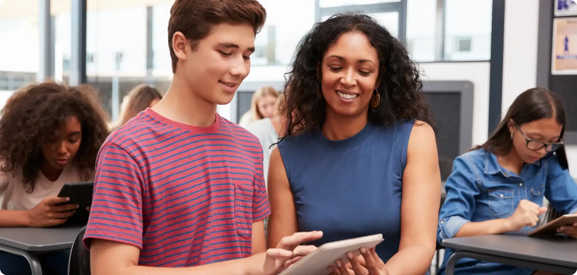 a student with counselor smiling