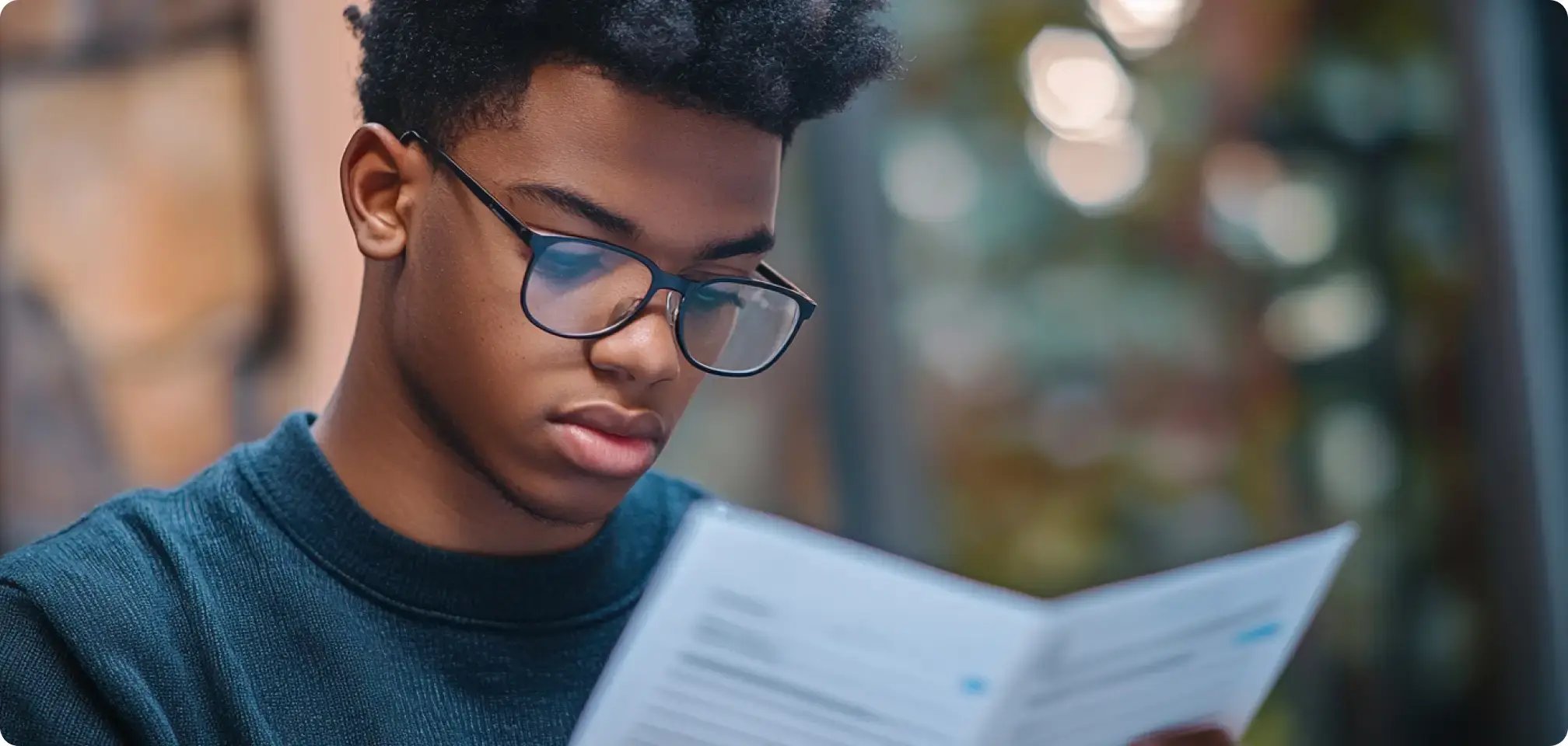 a student looking at report card