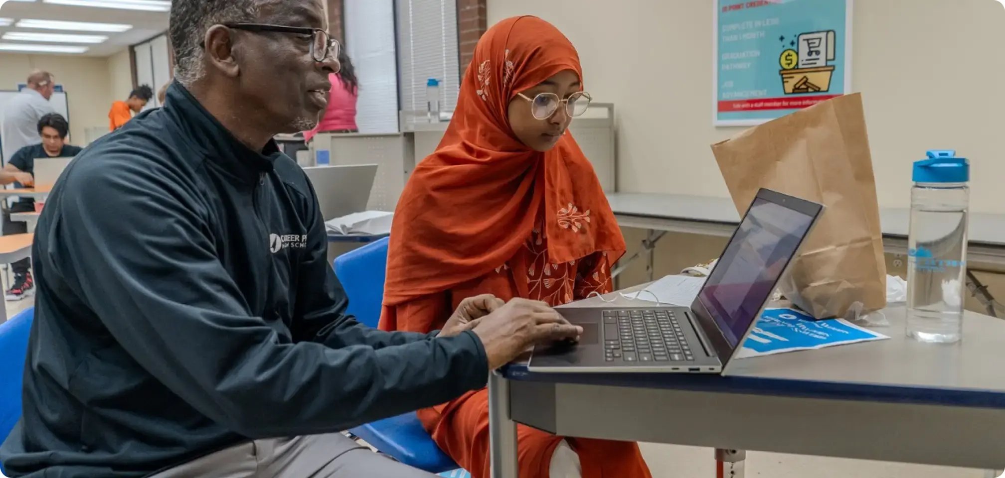 Mentor helping student with academic needs