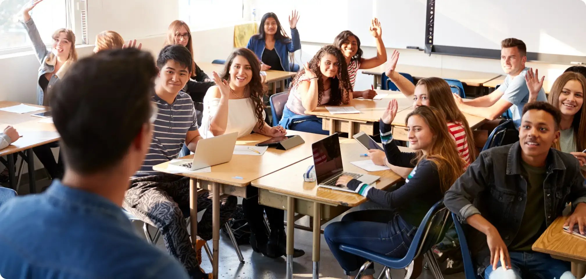 a student smiling in class